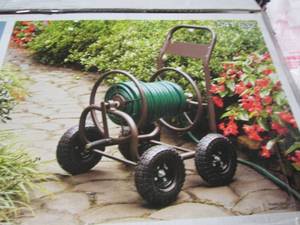 lot 97 image: Hampton Bay 4-Wheel Hose Cart open ...