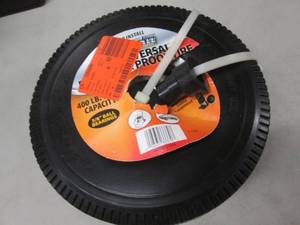 lot 120 image: Milwaukee 10 in. Flat Free Wheel Re...