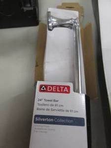 lot 184 image: Delta 24 inch Towel Bar Silverton C...