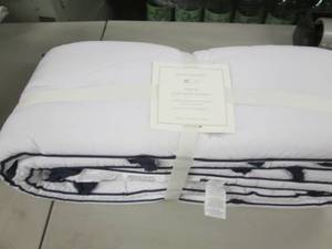 lot 267 image: Pottery Barn Organic Pom Pom Bumper...