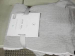 lot 303 image: Pottery Barn Matelase Crib Skirt...