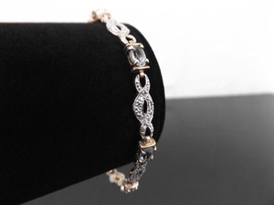 lot 43 image: .925 Sterling Silver Topaz Vermeil Bracelet