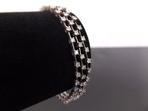 lot 44 image: .925 Sterling Silver Crystal 3 Strand Hinged Ballroom Bracelet