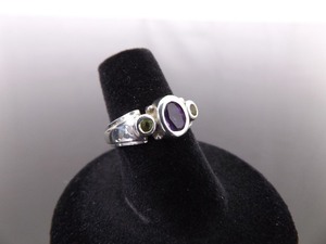lot 61 image: .925 Sterling Silver Faceted Amethyst and Peridot Ring Size 6
