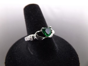 lot 62 image: .925 Sterling Silver Emerald Crystal Claddagh Ring Size 9