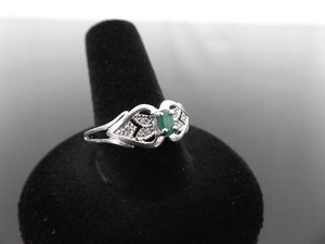 lot 63 image: .925 Sterling Silver Emerald and Crystal Accented Ring Size 10