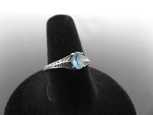 lot 66 image: .925 Sterling Silver Oval Cut Topaz Scrolled Ring Size 8
