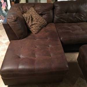 lot 7 image: Ashley Furniture Sectional Couch with Ottoman