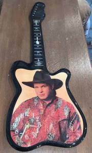 lot 161 image: GARTH BROOKS CLOCK GUITAR SHAPE WALL MOUNT VERY RARE FIND