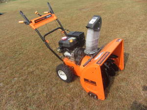 lot 11 image: Remington Snowblower