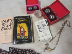 Taro  cards, glass orb, Chinese bal...