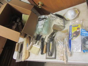 Painting supplies with rollers, tro...