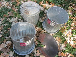 Three 6-gallon tin pails - one with...