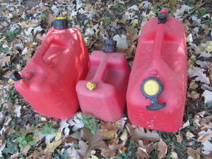Gas cans two 2.5 gallons, one 1 ga...