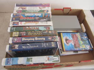 VHS childrens with a couple DVDs...