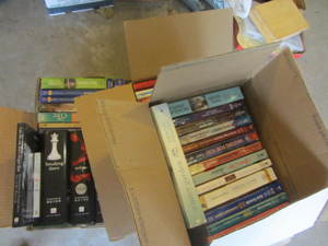 Three flats of paperbacks with Twil...