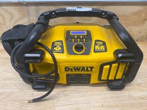 lot 62 image: Dewalt 2800 Peak Amp Jump Starter 1000-Watt Power Inverter with Digital Compressor
