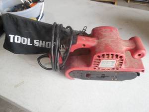 lot 20 image: HAND HELD BELT SANDER