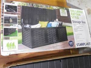 lot 47 image: Starplast 167 Gal. XL Black Plastic Rattan Deck Box