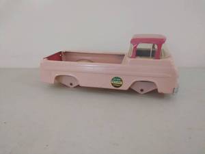 lot 197 image: Vintage Pink Metal Ford Pickup Truck
