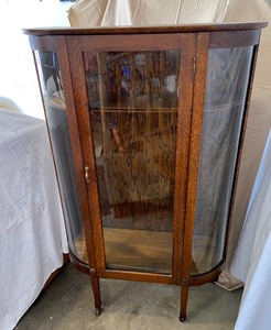 lot 17 image: Stunning Antique Curved Glass Cabinet on Wood Casters