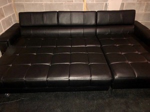 lot 162 image: Black Plether Sofa and Ottoman
