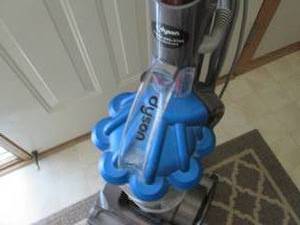 lot 18 image: Dyson Vacuum & 3 Runner Rugs...