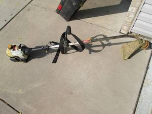 lot 65 image: Ryobi 31CC 17 Weed Whip...