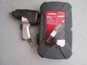 lot 72 image: Husky 12-Volt Cordless Ratchet 38...