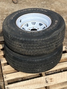 lot 22 image: Set Of (2) 31 x 10.50 x 15 Trailer Tires & Wheels