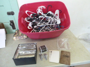lot 23 image: Tote Full of Plastic Hangers