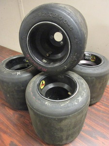 lot 433 image: MAXXIS GO-KART RACING TIRES WITH OUTLAW WHEELS RIMS