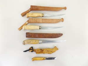 lot 28 image: Lot of 4 Leather Sheathed J. Marttiini Filet Knives