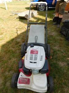 White Self Propelled Lawn Mower