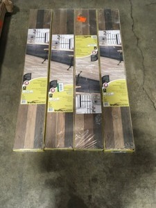 lot 44 image: 4 CASES WITH TRAFFICMASTER Bishop Manor Oak 7mm Thick x 7-23 in. Wide x 50-58 in. Length Laminate Flooring (24.17 sq. ft.  case) SEE PICS