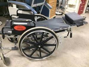 lot 4 image: RECLINING WHEELCHAIR WITH PADDED BACK AND NECK PILLOW - NICE CONDITION - ARMS PADS HAVE WEAR