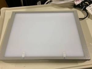 lot 57 image: Henry Schein X-ray Illuminator Model 313-6330 110 VOLTS