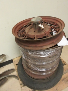 lot 508 image: MODEL A FORD WIRE WHEELS AND A TIRE