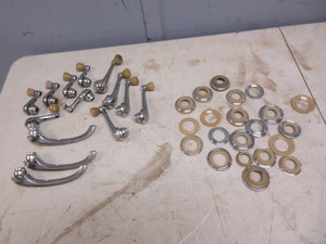 lot 598 image: 1940 BUICK INTERIOR WINDOW CRANKS, DOOR LATCHES, 1940-1941 INTERIOR HANDLE ESCUTCHEONS
