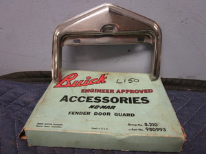 lot 678 image: 1951-1952 BUICK FENDER FUEL DOOR GUARD
