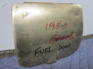 lot 683 image: 1940 BUICK FUEL DOOR