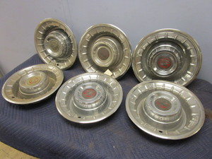 lot 801 image: 1956 CADILLAC HUBCAPS
