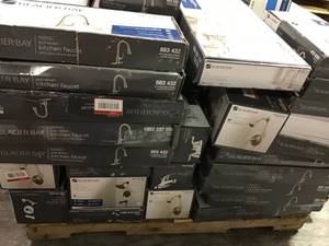 lot 27 image: Pallet with assorted Glacier Bay Faucets Original customer returns various models and conditions