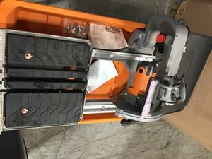 lot 28 image: Ridgid 7 Tile saw with Stand in working condition
