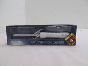 lot 116 image: Curling iron