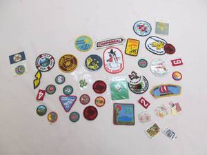 lot 152 image: Vintage badges, stamps