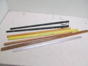 lot 199 image: Adverting measuring sticks