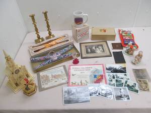lot 280 image: Vintage pictures, candle sticks, calendar, hangers