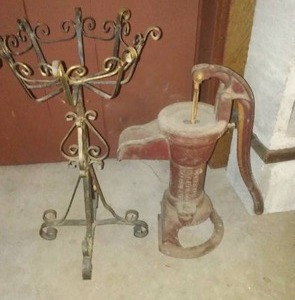 lot 196 image: Well pump head & metal stand.
