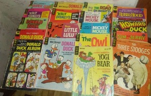 lot 556 image: 18 comic books, Walt Disney, Donald Duck, Mickey Mouse, 3 stooges and more.